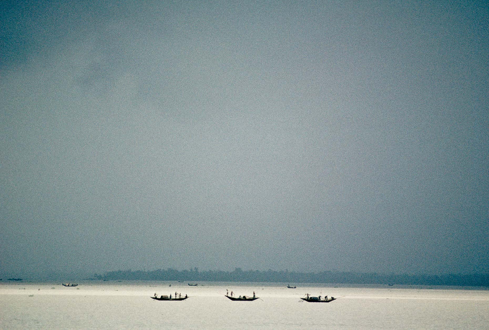Fishing on the Pankali river 1990, Bangladesh