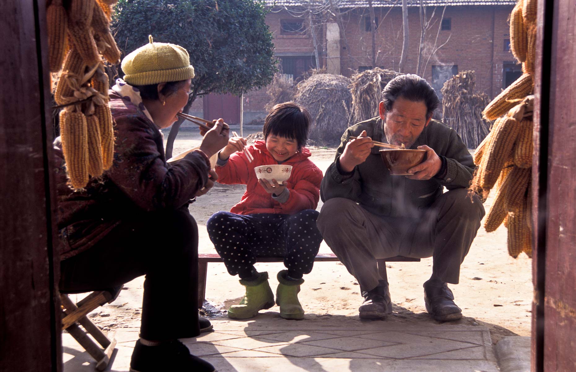 Family having lunch in Chinese village
